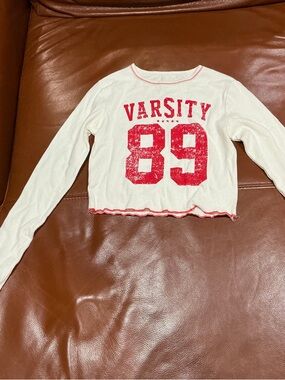 Modern Lux White Long-Sleeve Tee with Red Varsity Graphic